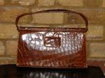 Mid brown crocodile skin bag with handles