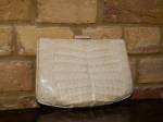 Cream crocodile skin clutch bag