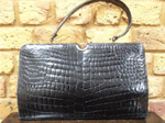 Black crocodile skin bag