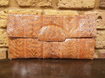 Tan snakeskin clutch bag 