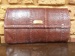 Chocolate brown snakeskin clutch bag