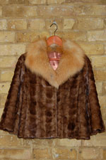 Brown sheared mink jacket with fox trim