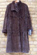 Mid-brown scalloped female mink coat