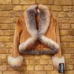 Laser cut whiskey sheared mink jacket with fox collar and cuffs