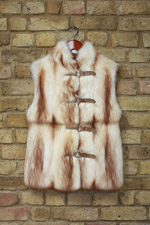Light brown golden fitch gilet with snakeskin fastening