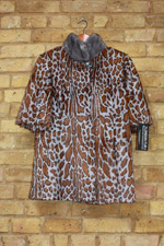 Grey/brown kid print coat with blue iris collar