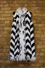 Black/white long mink gilet with fox and feather trim