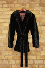 Black horizontal mink jacket with belt