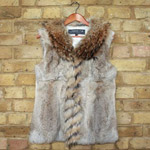 Natural rabbit gilet with racoon trim