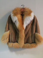 Pastel mink cape with gold fox trim