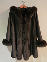 Reversible brown sheared mink coat with fox trim and hood