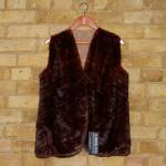 Brown/red squirrel gilet