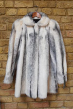 Pre-owned crossed mink jacket