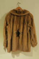 Light caramel mink jacket with leopard print star detail